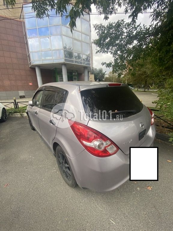 Фото Nissan Tiida 22