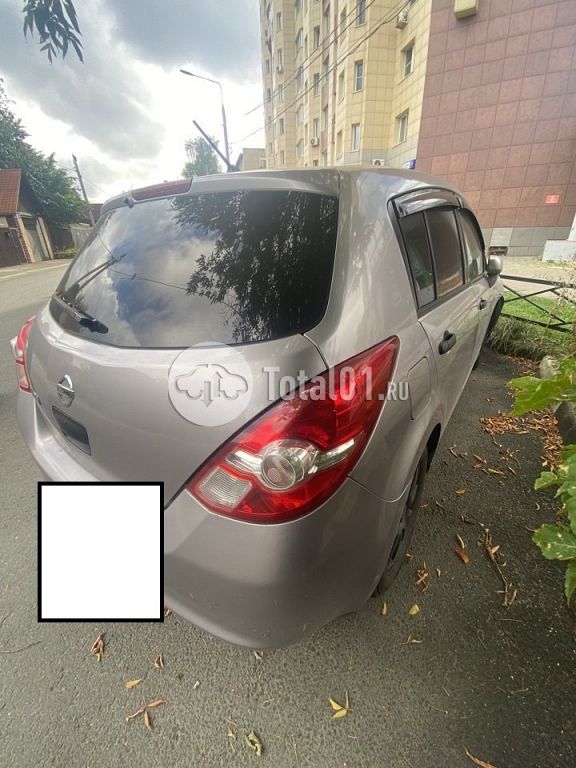 Фото Nissan Tiida 24