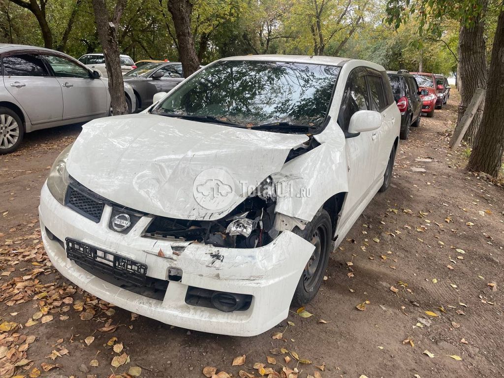 Фото Nissan Wingroad 8