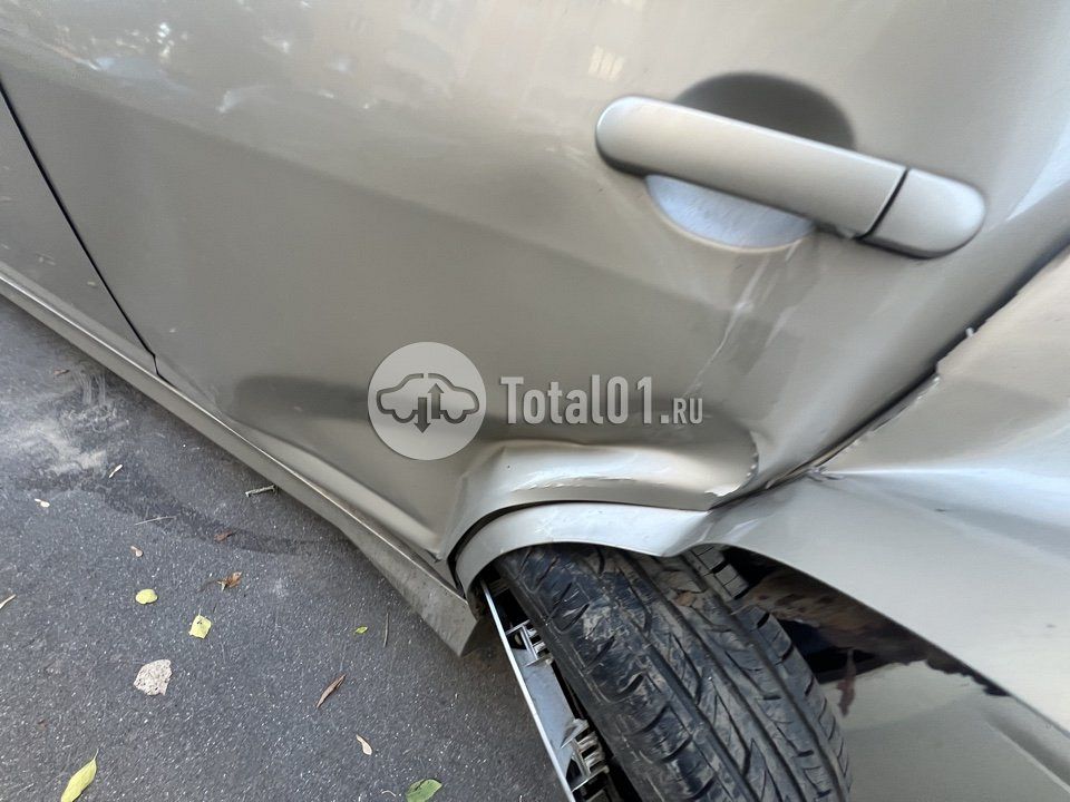 Фото Nissan Tiida 8