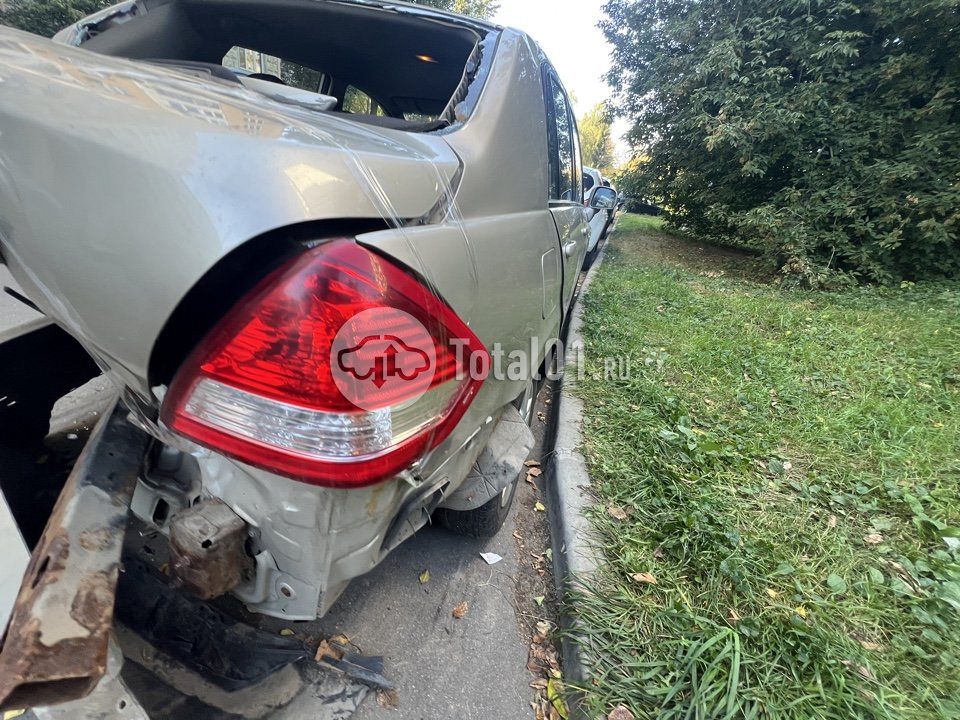 Фото Nissan Tiida 10