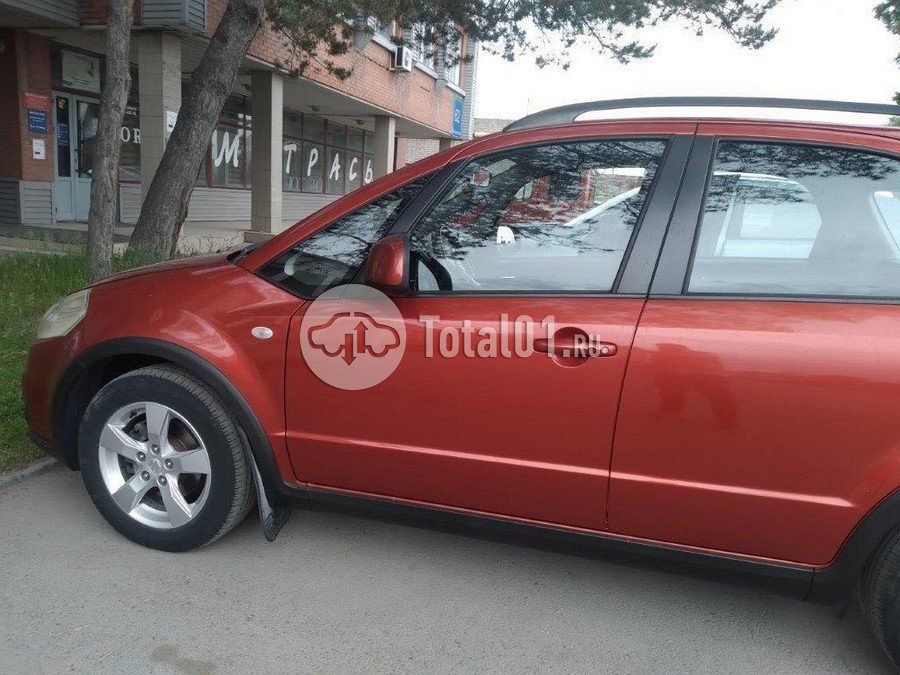 Фото Suzuki SX4 12