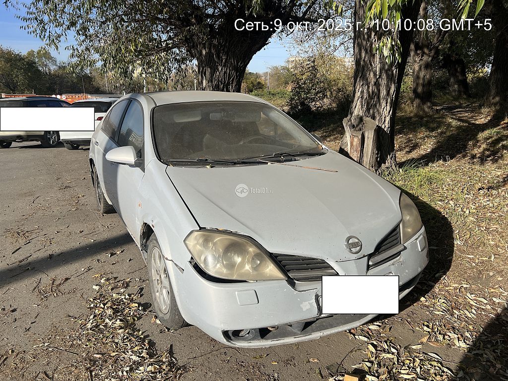 Фото Nissan Primera 6