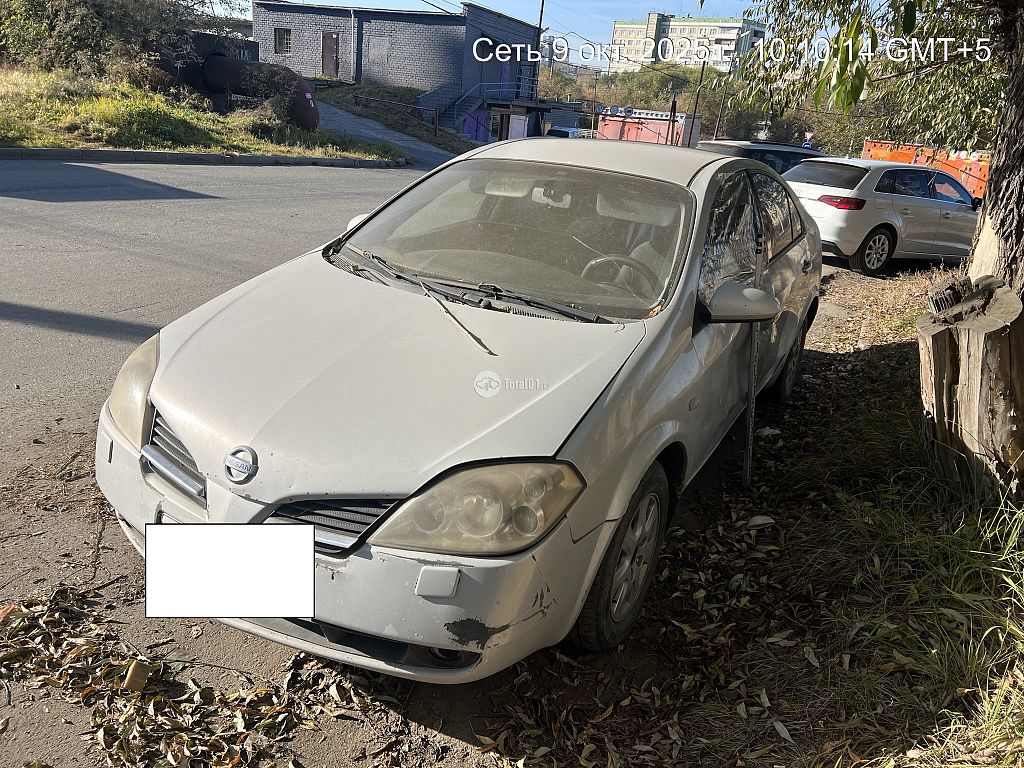 Фото Nissan Primera 8
