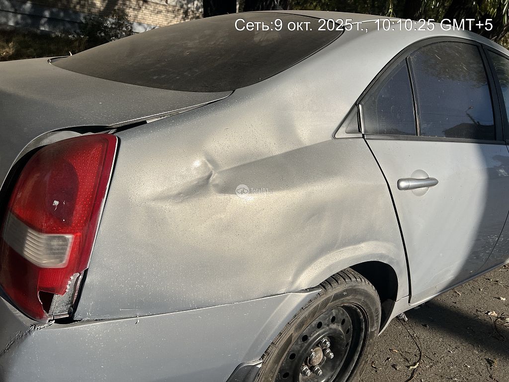 Фото Nissan Primera 16