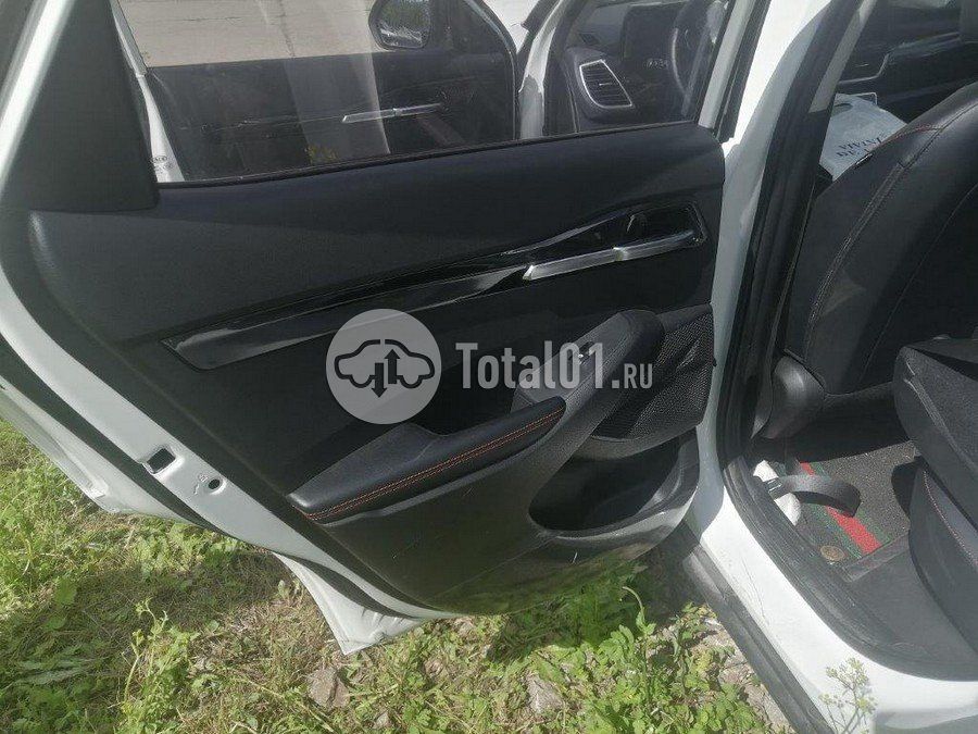 Фото KIA KX3 28