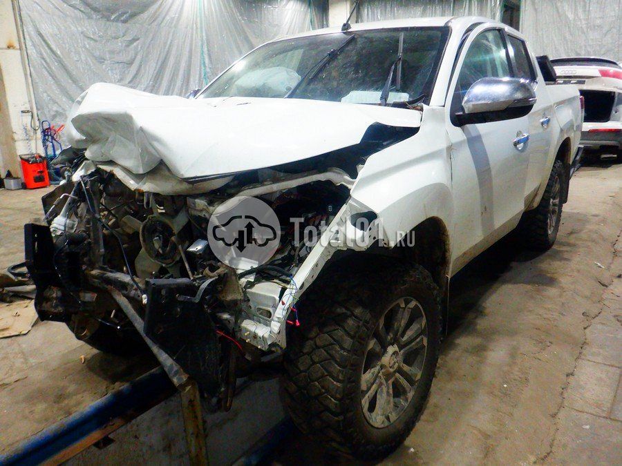 Фото Mitsubishi L200 6