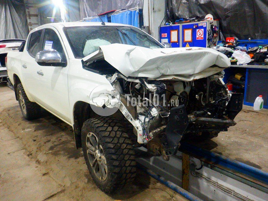 Фото Mitsubishi L200 8