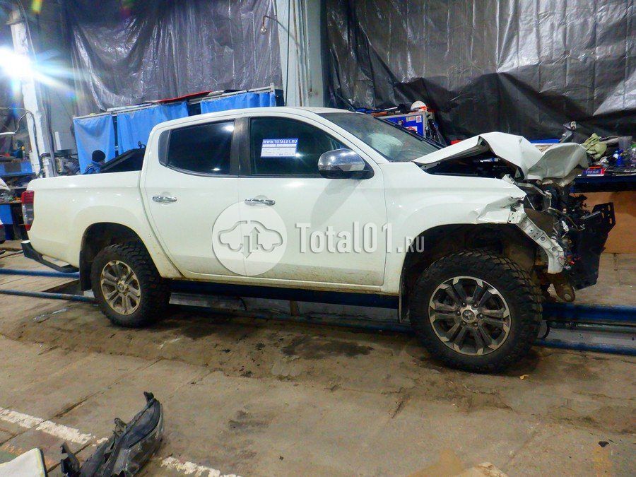 Фото Mitsubishi L200 10