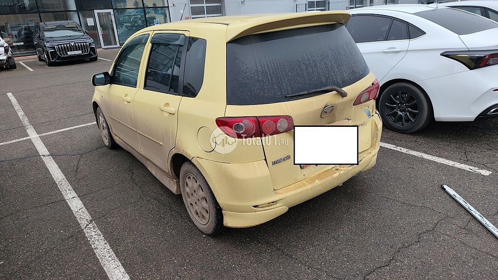 Фото Mazda Demio 4