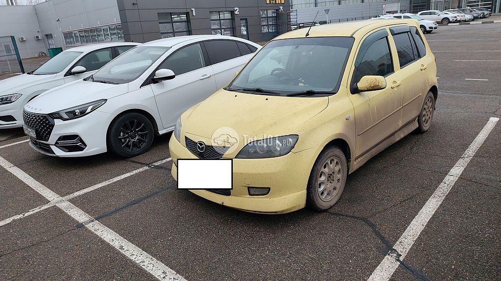 Фото Mazda Demio 6