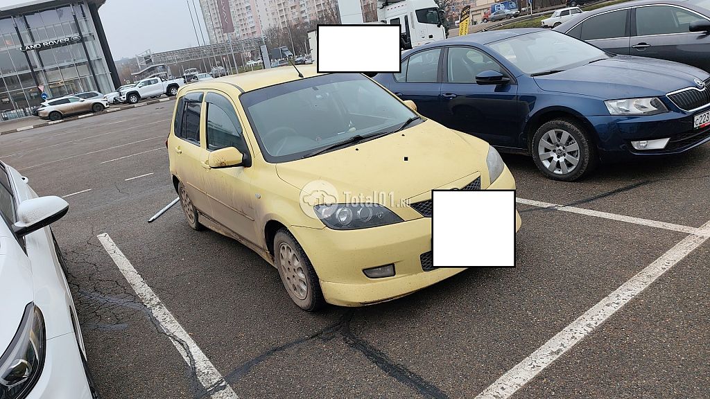 Фото Mazda Demio 8