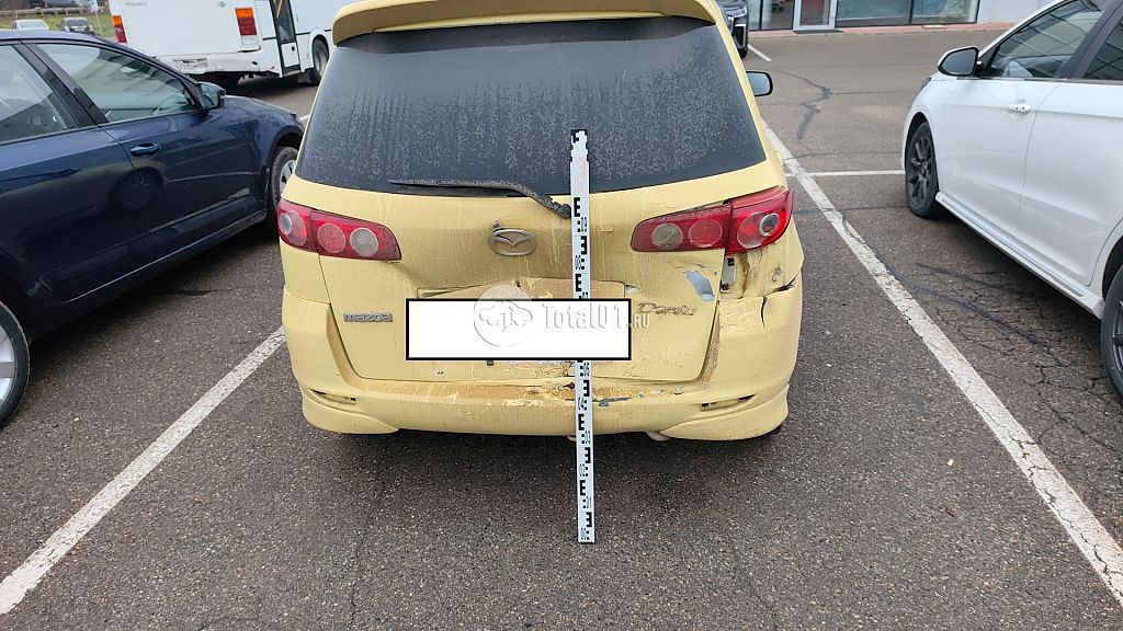 Фото Mazda Demio 10