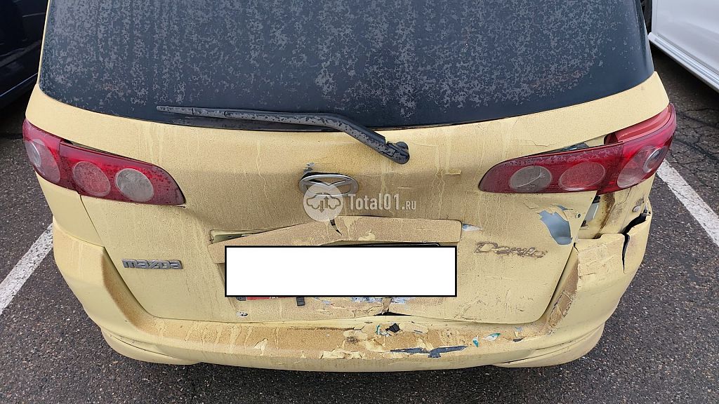 Фото Mazda Demio 12