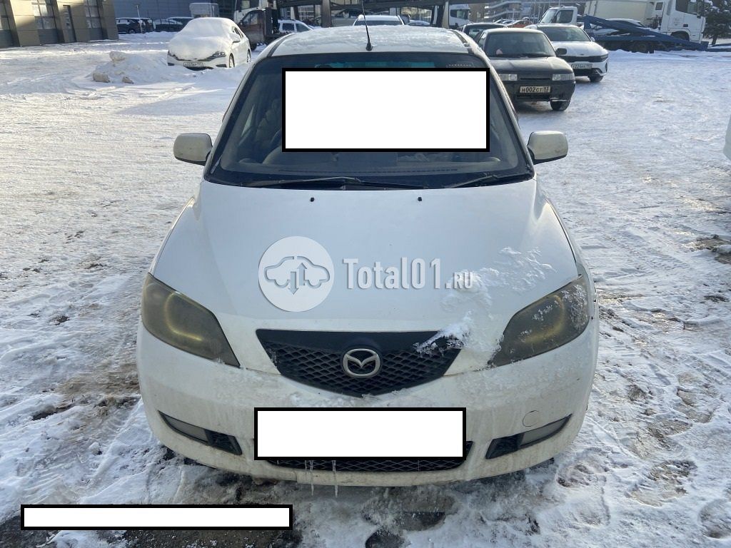 Фото Mazda Demio 4