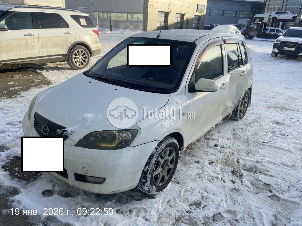 Фото Mazda Demio 6