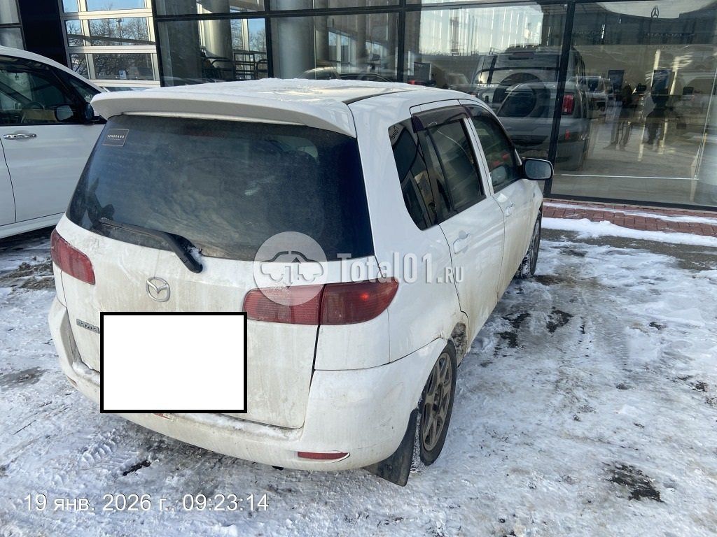 Фото Mazda Demio 12