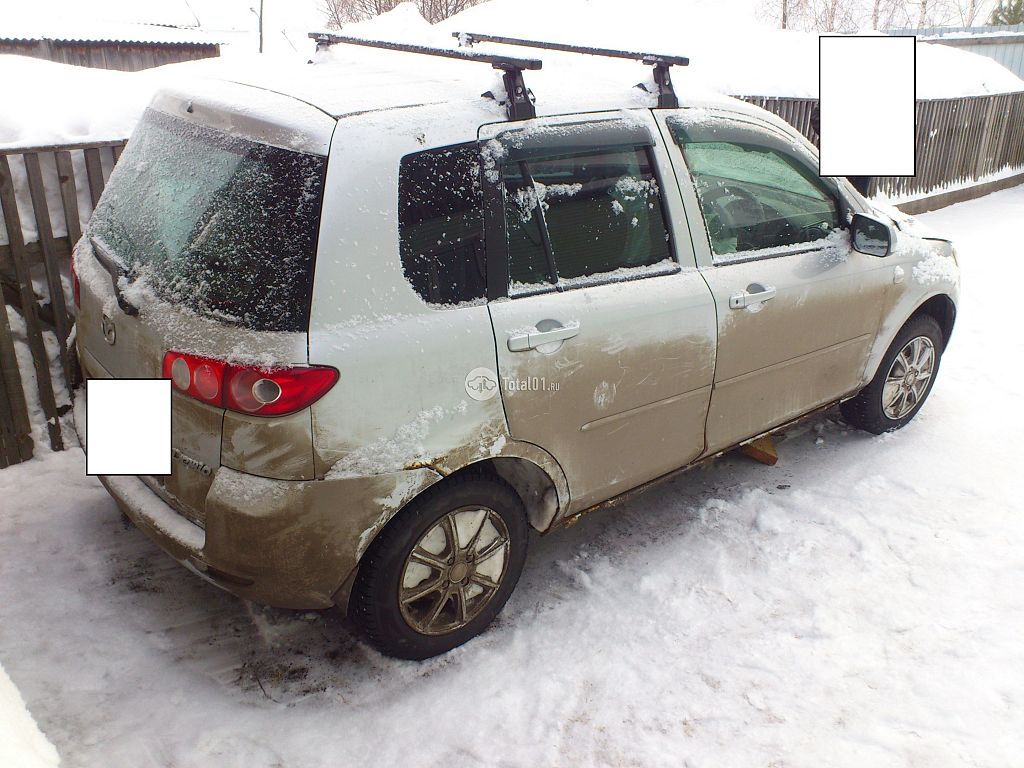 Фото Mazda Demio 8