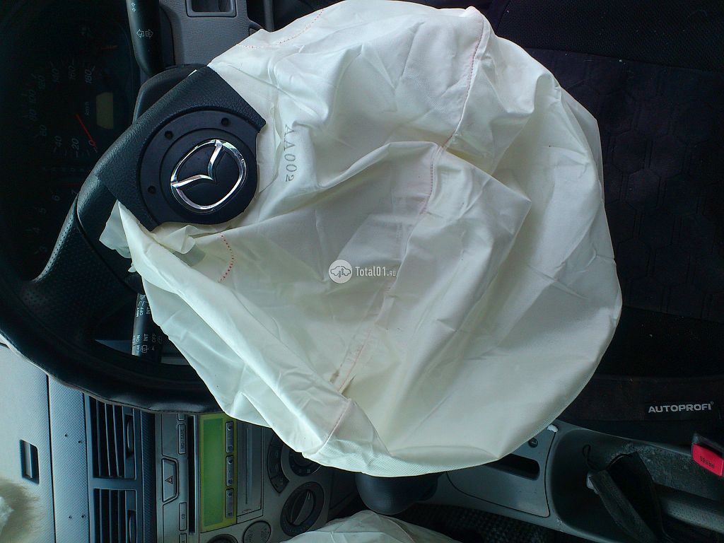 Фото Mazda Demio 10