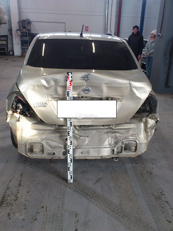 Фото Nissan Tiida 8