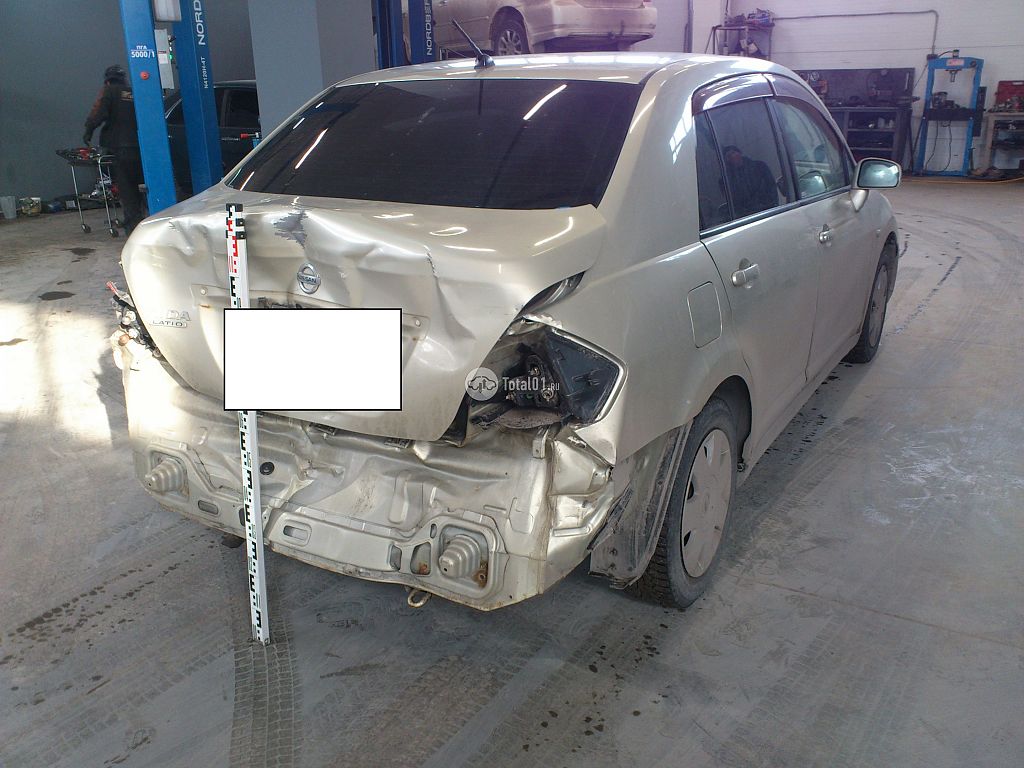 Фото Nissan Tiida 12