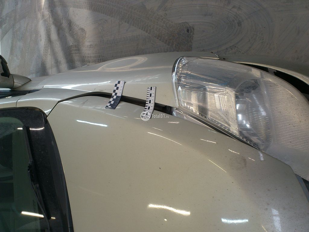 Фото Nissan Tiida 14