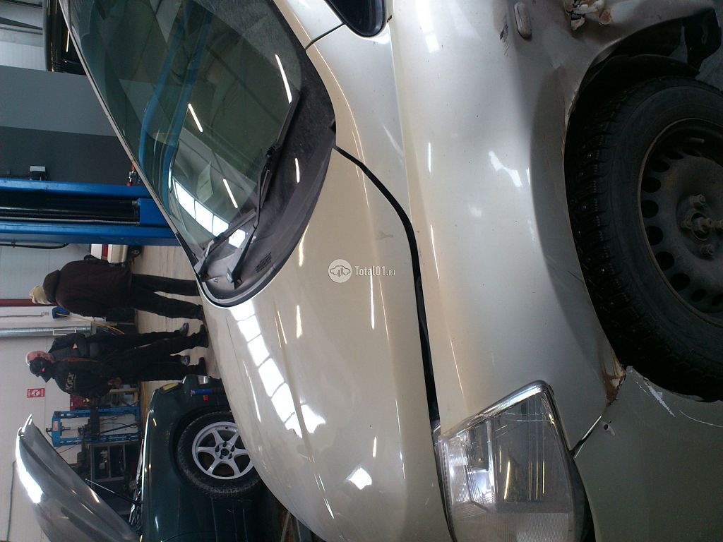 Фото Nissan Tiida 38