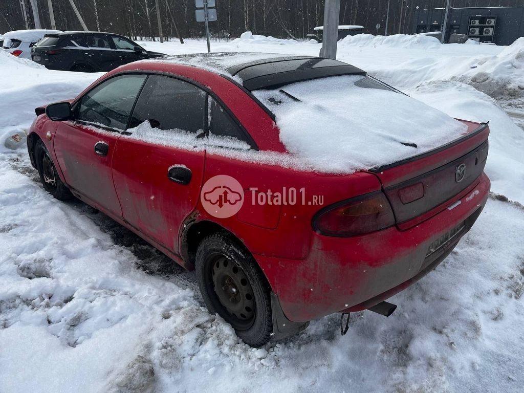 Фото Mazda 323 16