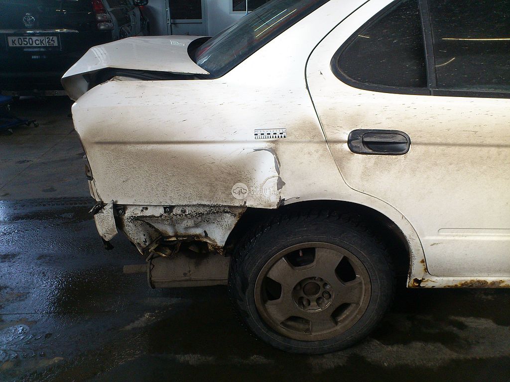 Фото Nissan Sunny 14