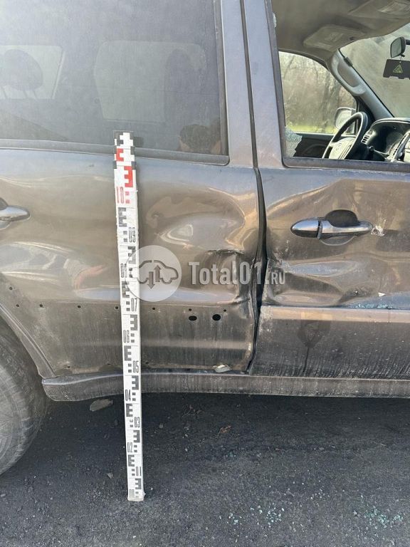 Фото Mazda Tribute 8