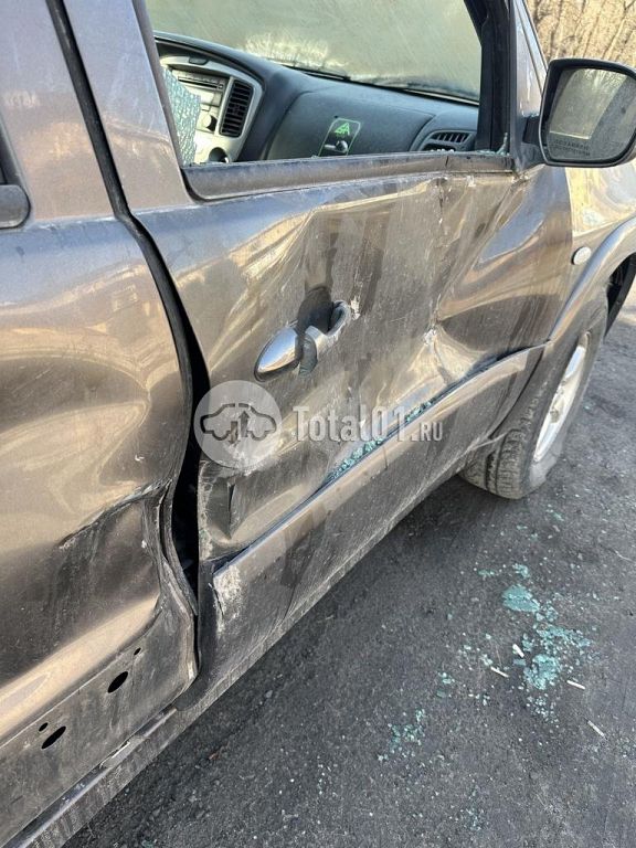 Фото Mazda Tribute 12