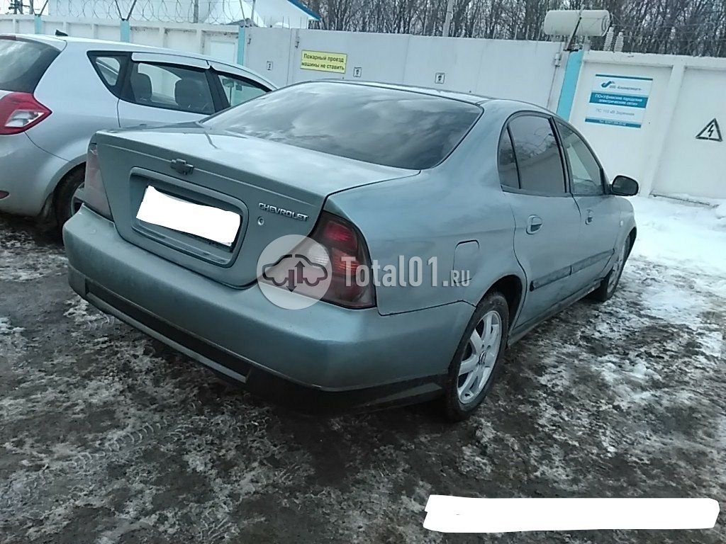 Фото Chevrolet Evanda 8