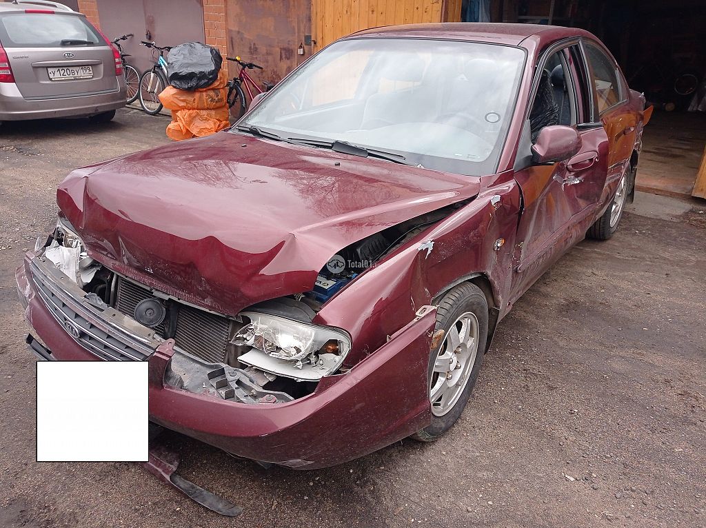 Фото KIA Spectra 70