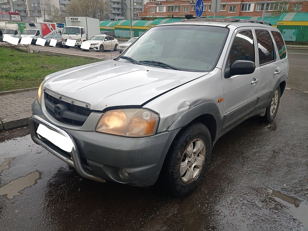 Фото Mazda Tribute 4