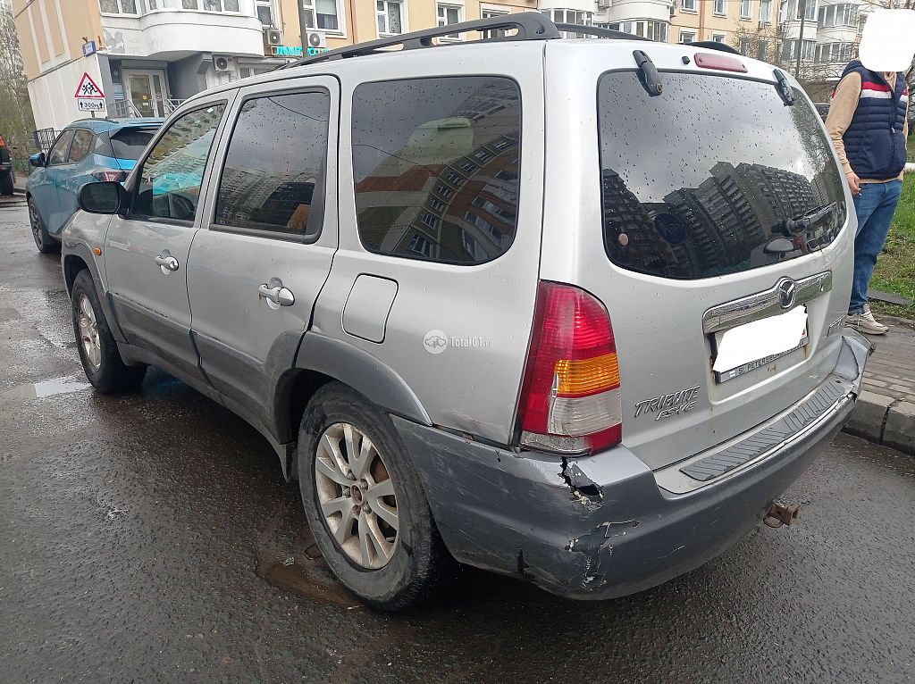 Фото Mazda Tribute 8