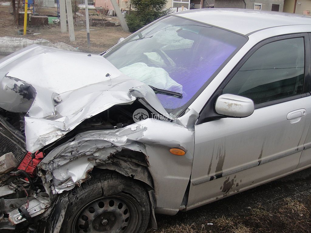 Фото Mazda Familia 16