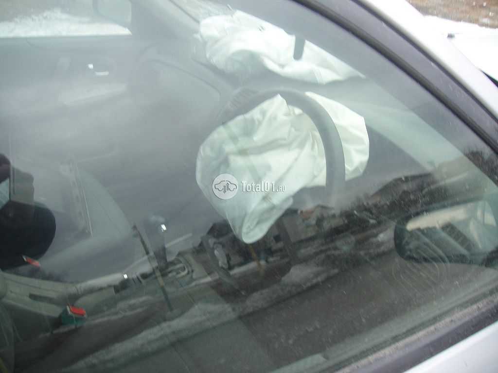 Фото Mazda Familia 18