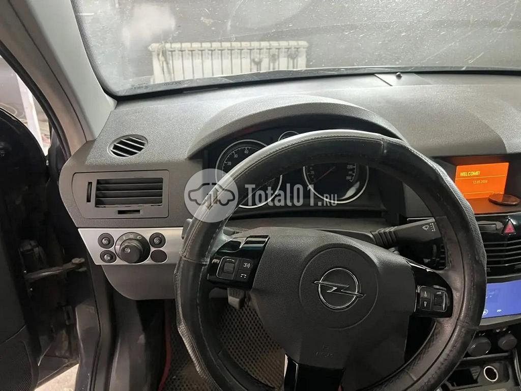 Фото Opel Astra 16