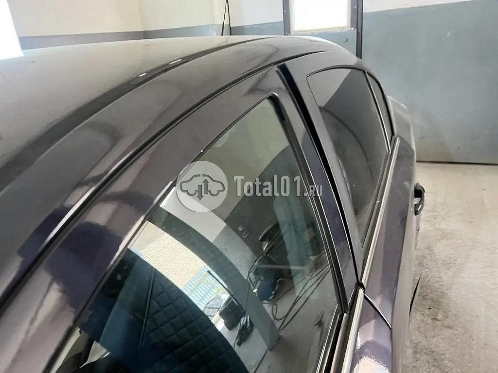 Фото Opel Astra 28