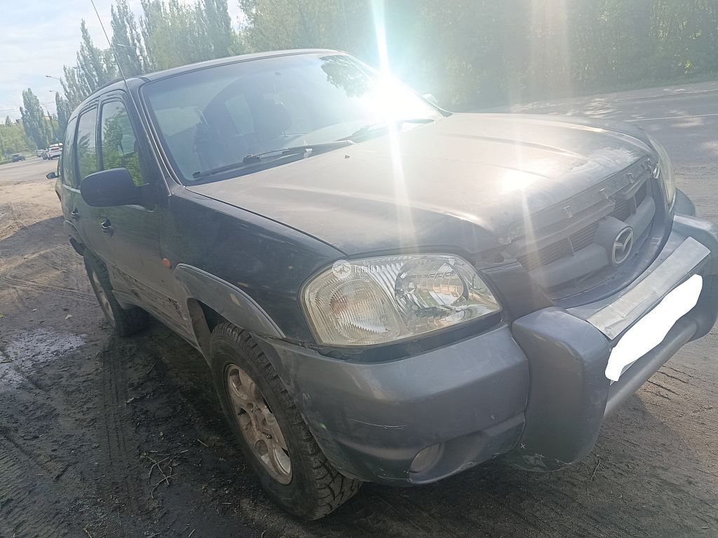Фото Mazda Tribute 4