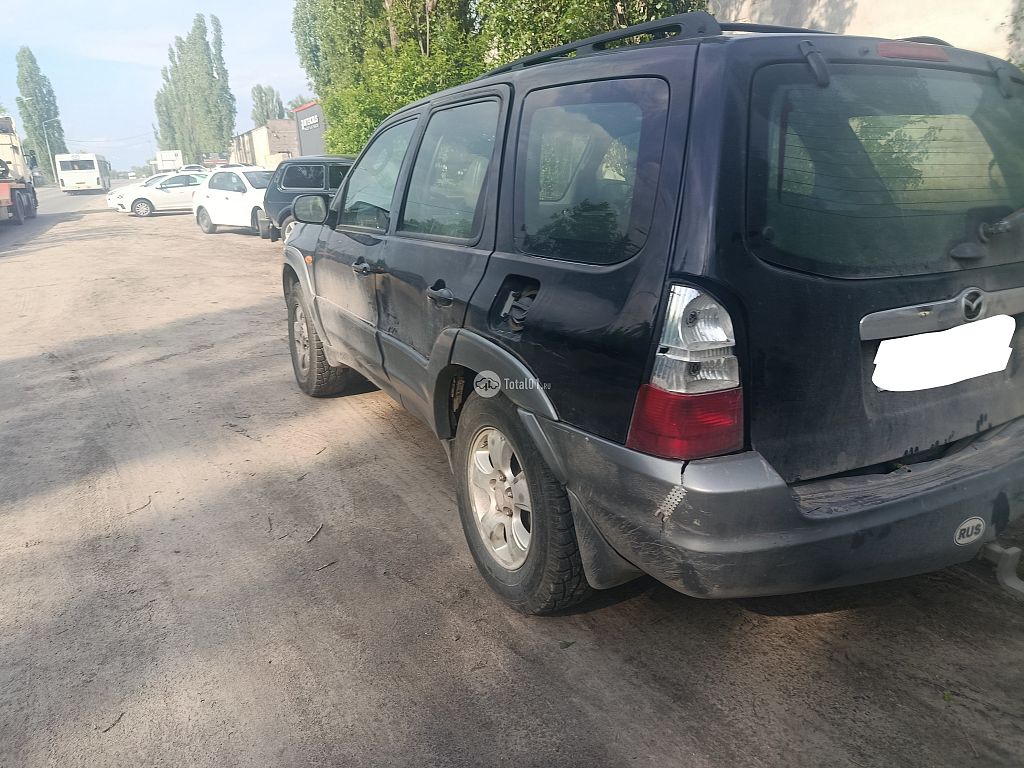 Фото Mazda Tribute 8