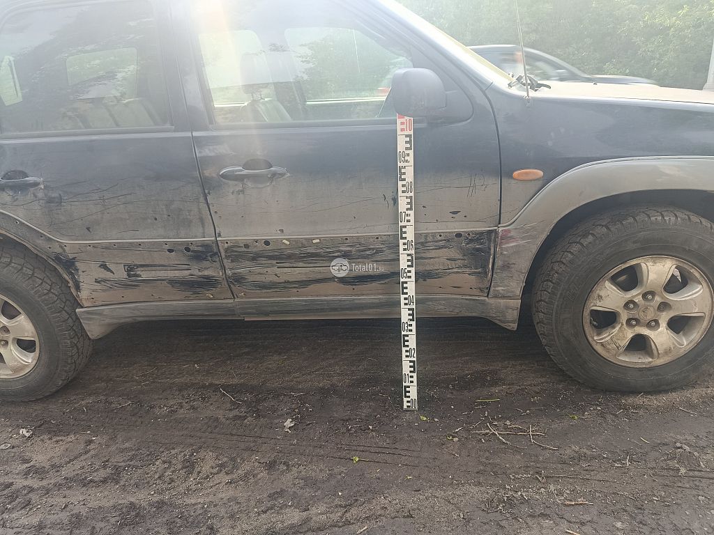 Фото Mazda Tribute 10