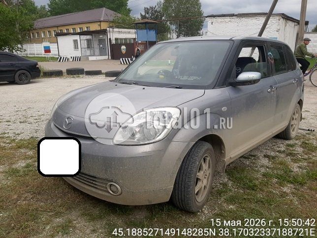 Фото Mazda Verisa 8