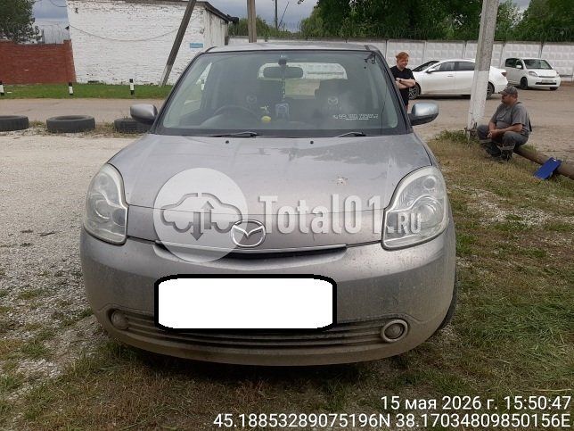 Фото Mazda Verisa 10