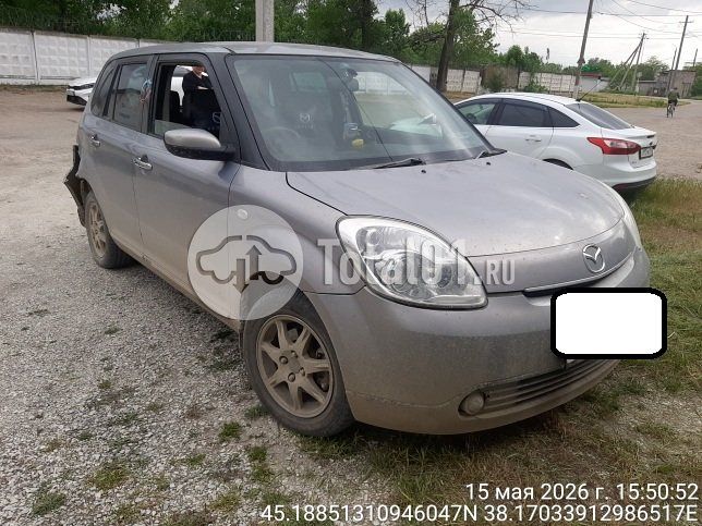 Фото Mazda Verisa 12