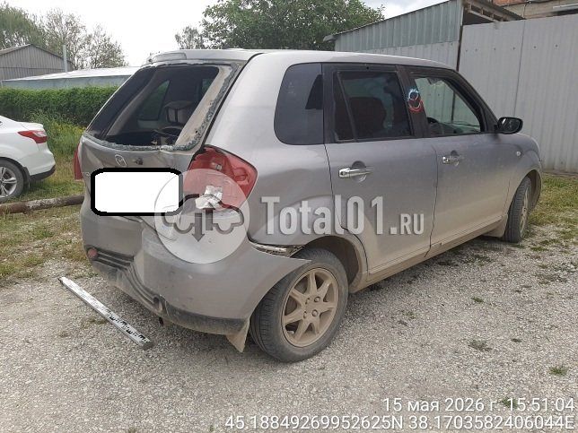 Фото Mazda Verisa 16