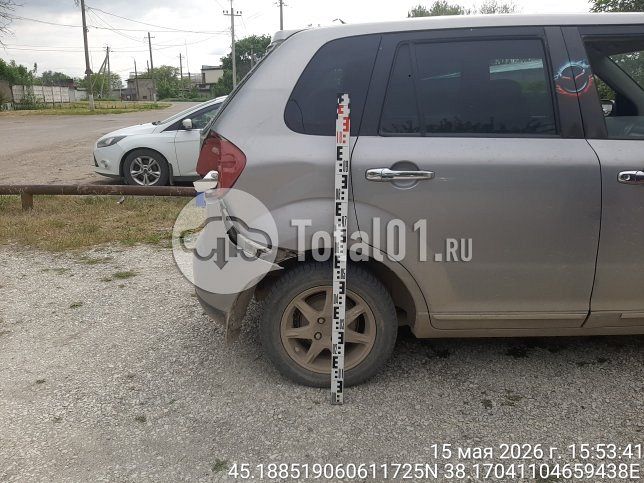 Фото Mazda Verisa 18