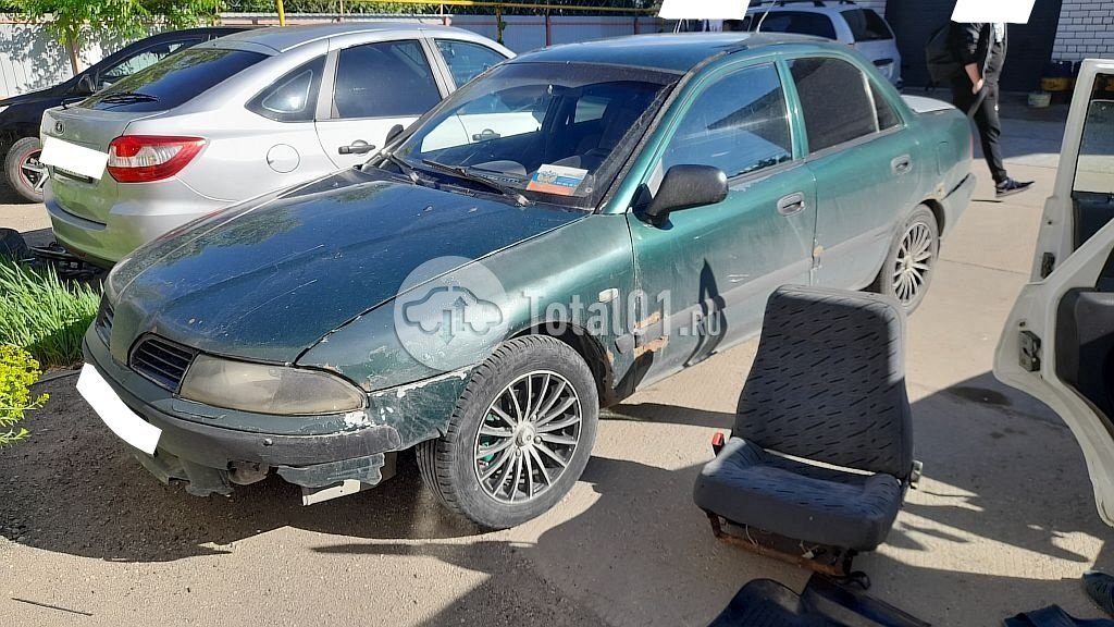 Фото Mitsubishi Carisma 4