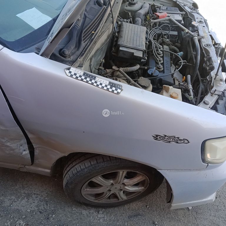 Фото Nissan Cube 8