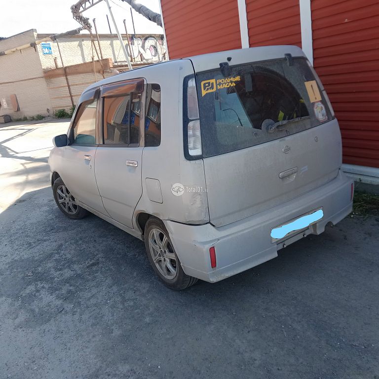 Фото Nissan Cube 44